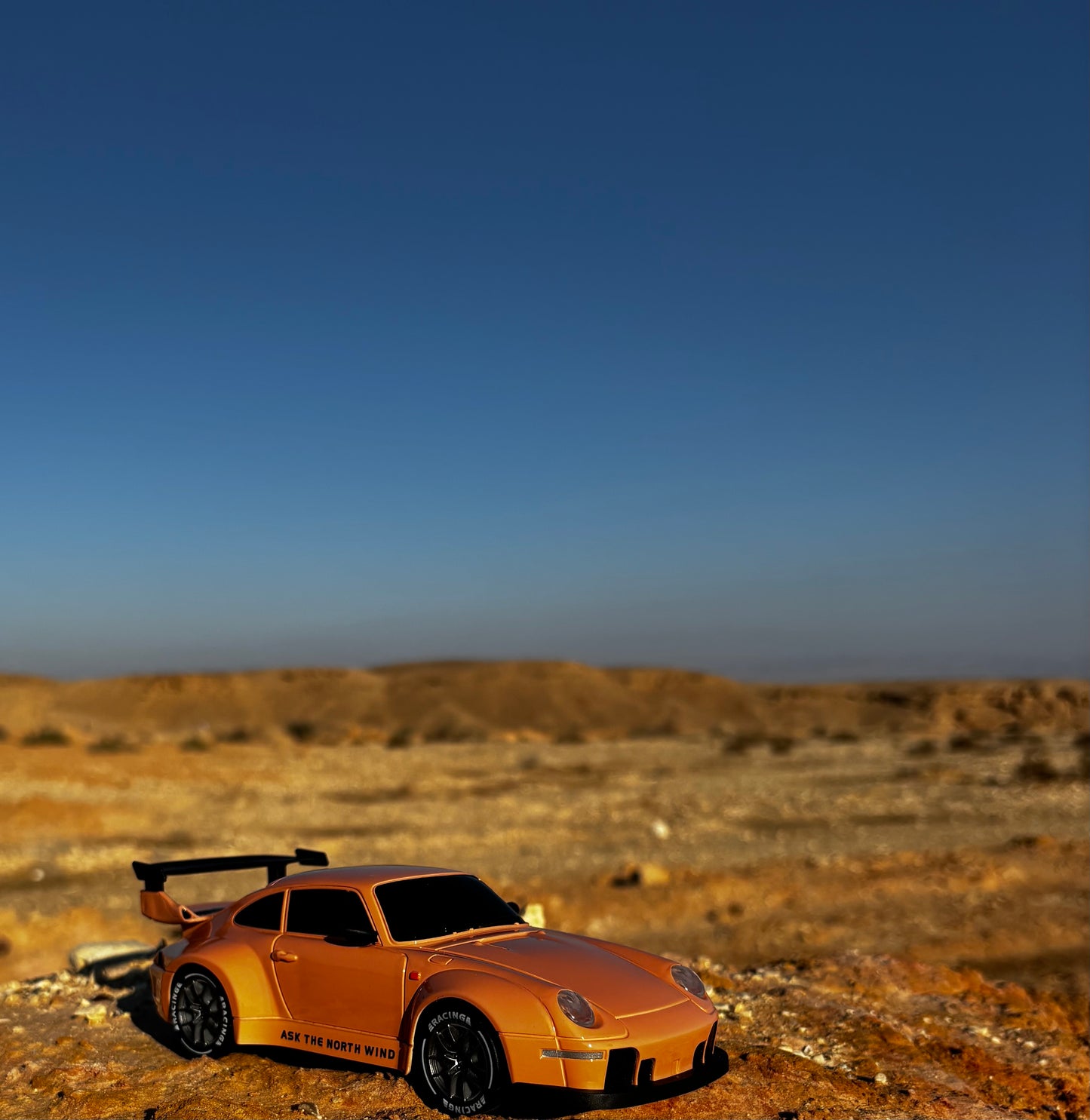 Sporio "Sandstorm" X1 – Rugged Speed Edition- Orange (2 Batteries)